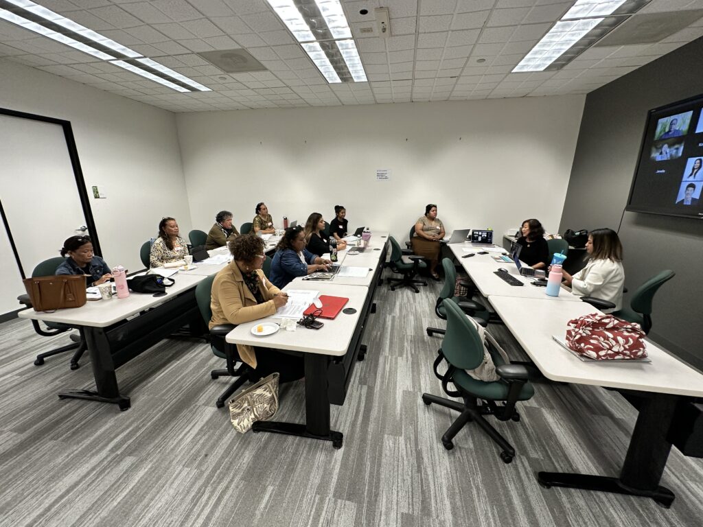 Bilingual community health workers receiving training. 